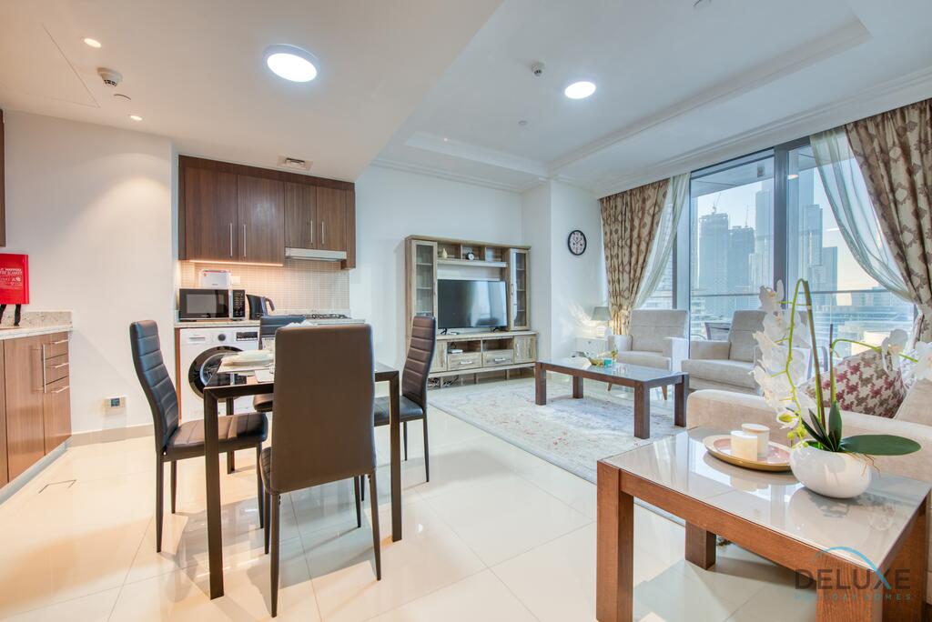 Homely 1BR Apartment At Boulevard Point Downtown Dubai By Deluxe Holiday Homes - thumb 1