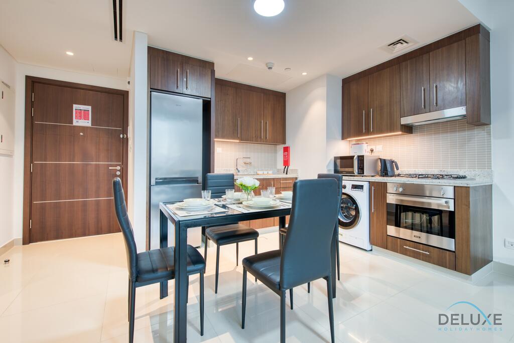 Homely 1BR Apartment At Boulevard Point Downtown Dubai By Deluxe Holiday Homes - thumb 4
