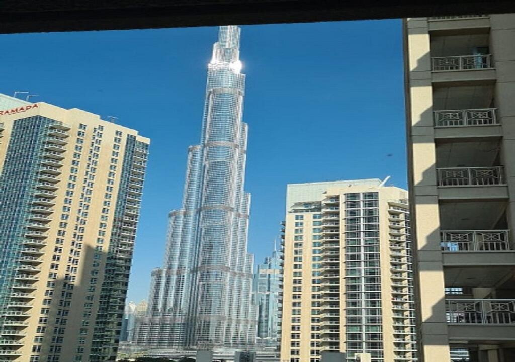 DOWNTOWN STUDIO WITH BOULEVARD VIEWs - thumb 2